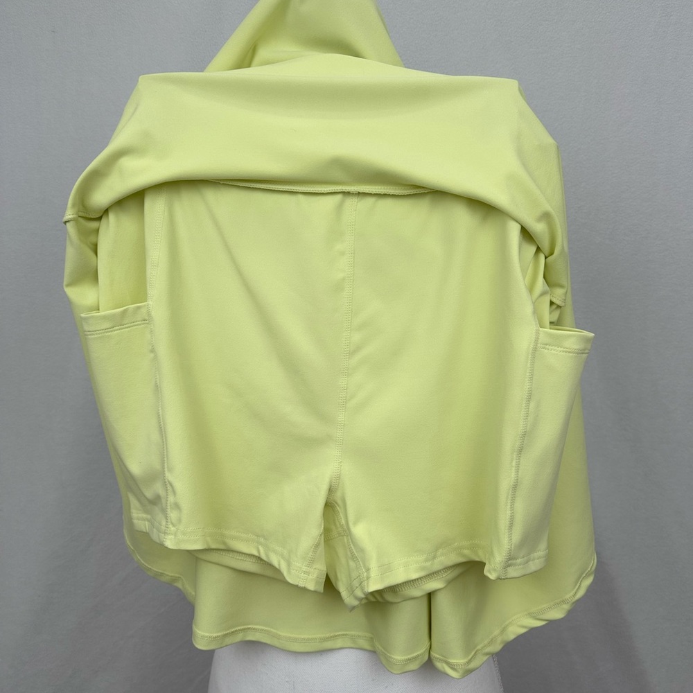 NWT Fabletics Flounce Skirt - LG - Lemon Crème skirt w/built-in shorts & pockets - Picture 8 of 16